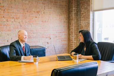 Man and woman in a business meeting.