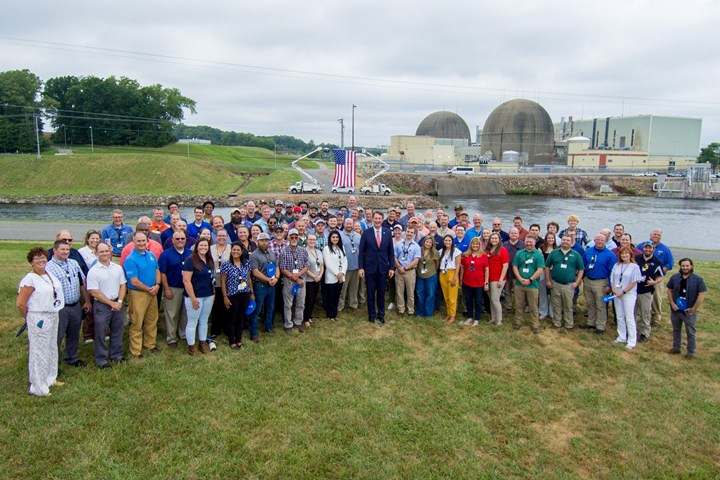 Photo of Gov. Glenn Youngkin and dozens of others in front of North Anna Nuclear Power Station in Virginia