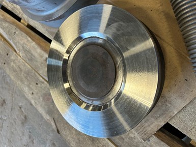 Photo of slide gate valve disc after repair.
